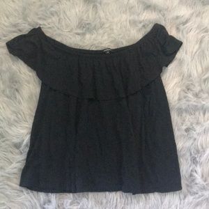 Stretchy off the shoulder top with ruffles on top